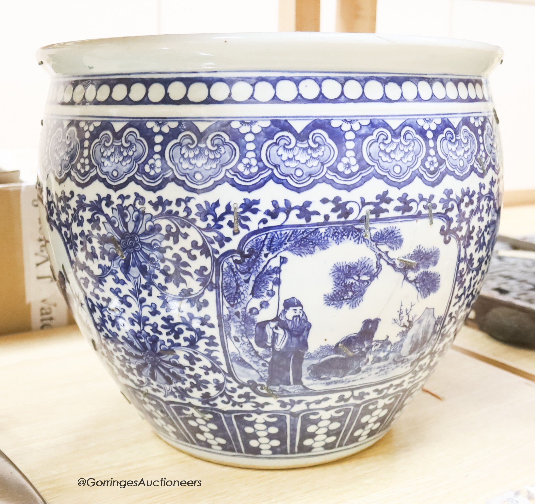 A 19th century Chinese blue and white jardiniere, height 34cm